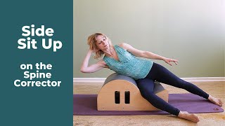 Side Sit Up on the Spine Corrector ⎮Pilates Encyclopedia