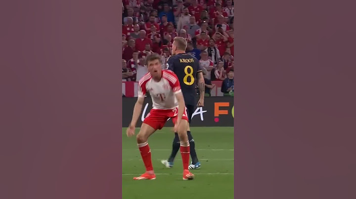 Toni Kroos and Thomas Muller's reaction to Kroos' pass and Vinicius' goal