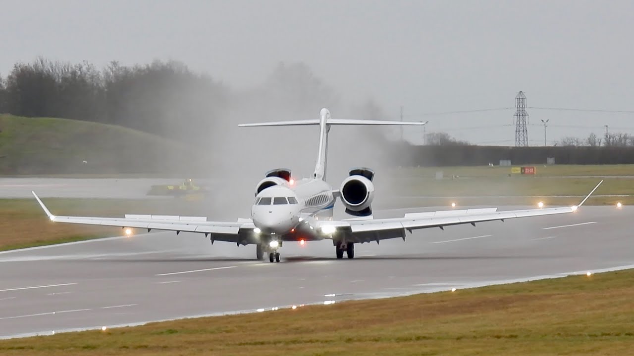 Crosswind landing on a wet runway | Solairus Aviation Bombardier Global 7500 N41127 at Cambridge