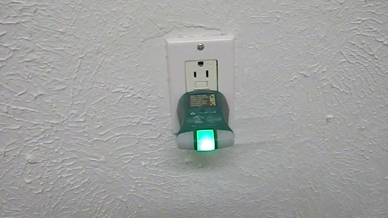 gfci outlet trips when light switch is turned on