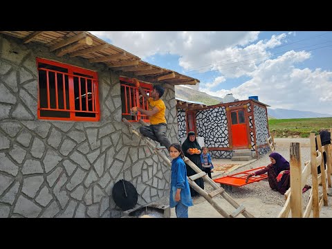 Painting the door and window of the house by Majid nomadic family