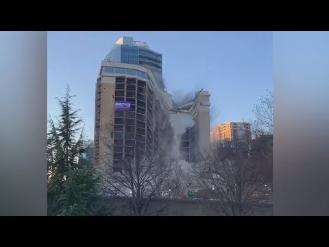 Watch this old Holiday Inn hotel collapse like an accordion in controlled demolition