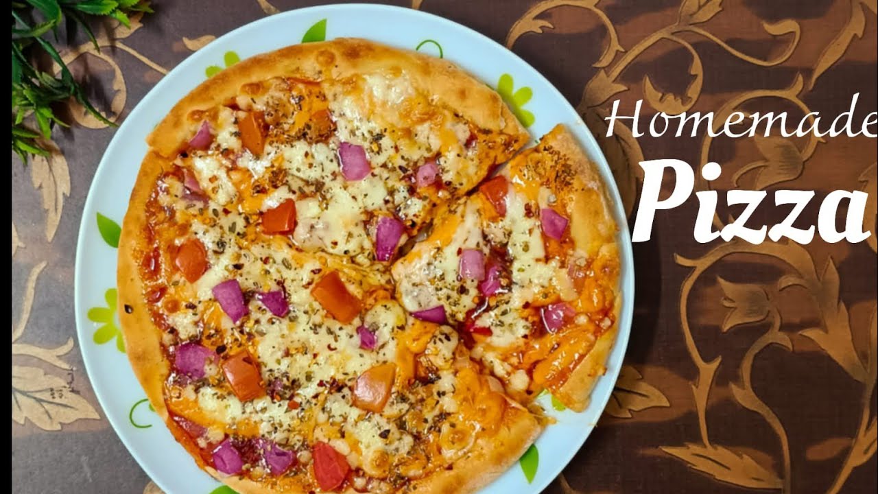 PIZZA BUDGET FRIENDLY BAKED AT HOME WITH MINIMAL INGREDIENTS ENJOY 