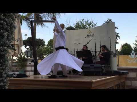 Turkish traditional Suri whirling dervishes perform in Istanbul