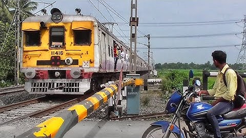 Bikers Waiting at Level Crossing | Furious Speedy EMU Local Train Skip Railgate | Eastern Railways