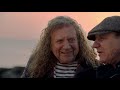 Brian Johnson &amp; Robert Plant share a gorgeous sunset on a beach in Wales