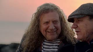 Brian Johnson & Robert Plant share a gorgeous sunset on a beach in Wales