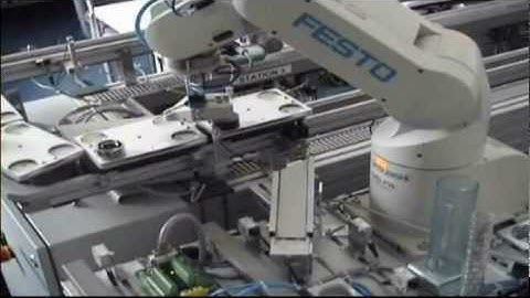 Robotic assembly station