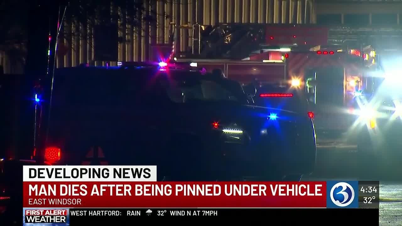 Man dies after being pinned under car carrier in East Windsor - YouTube