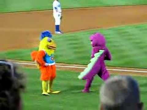 Famous Chicken battles Barney in a dance-off!