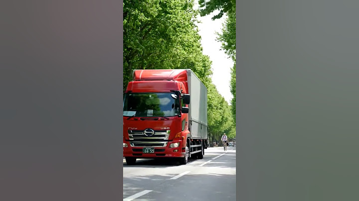 Long trailer Fusso truck drives through green street #aivideo #automobile #funny #crazycars #truck