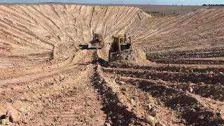 Caterpillar D10N and D8N moving some dirt digging Large Dam