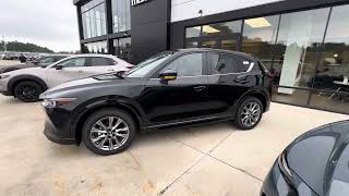 2024 Mazda cx5 roll down windows from key fob