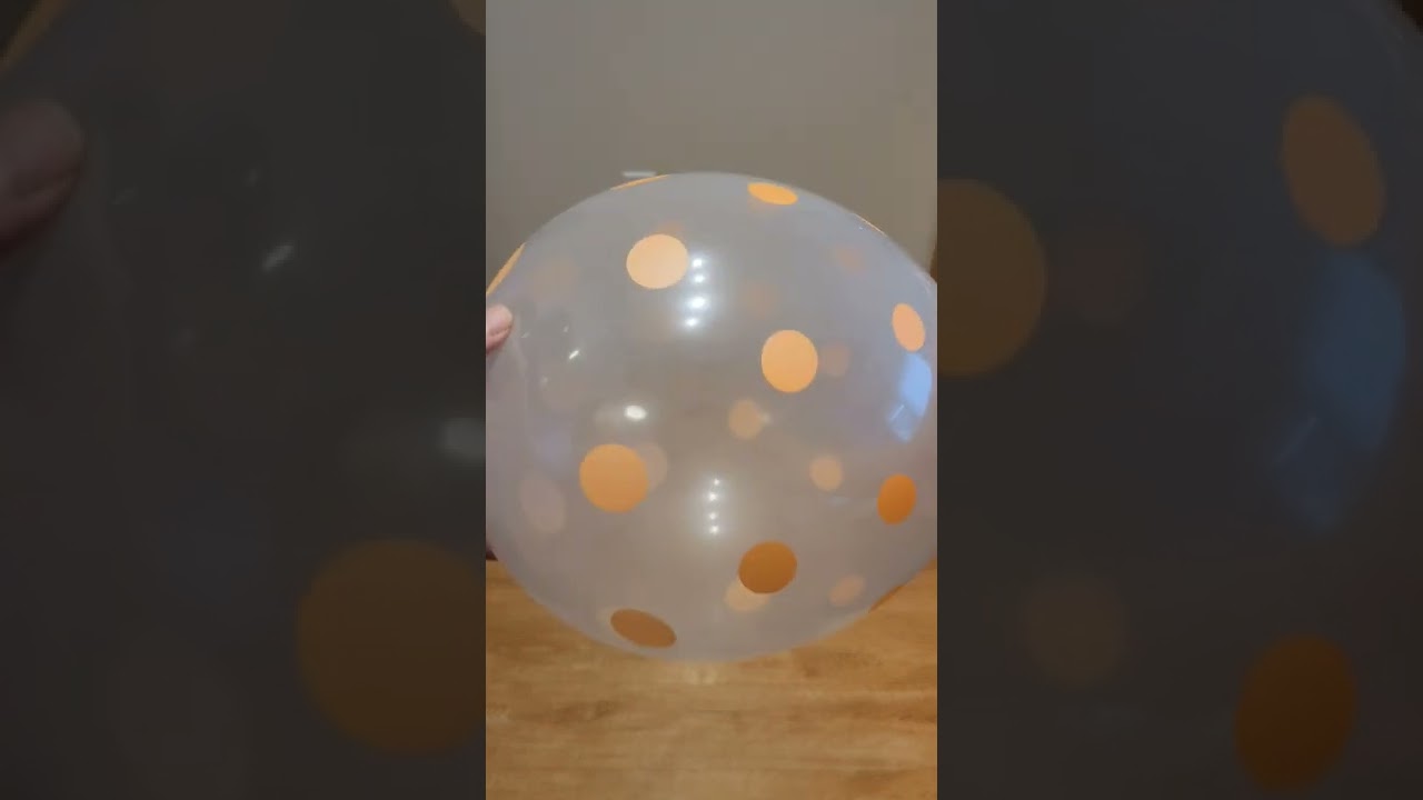 Spinning Hex Nuts Inside a Balloon in Slow Motion #physics #experiment #shorts