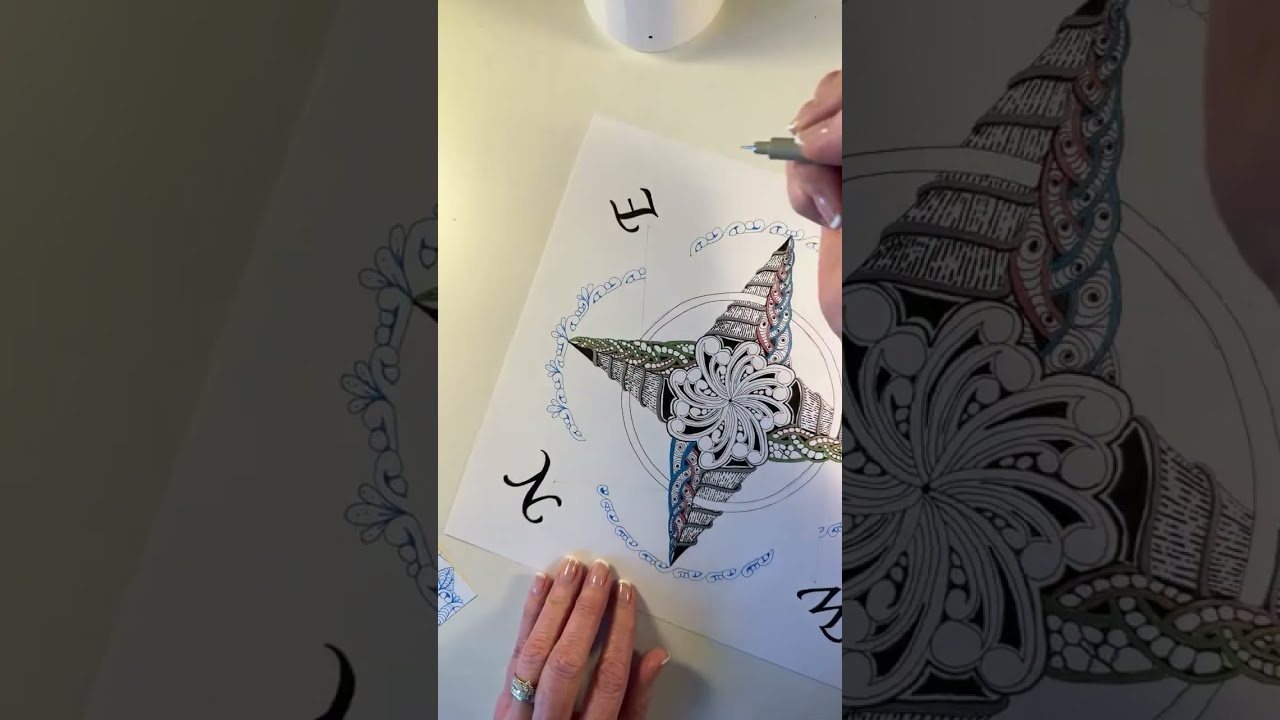 Sherry Barrett adds design to her compass rose drawing