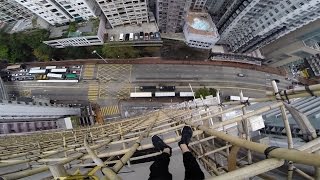 climbing dangerous chinese bamboo scaffolding