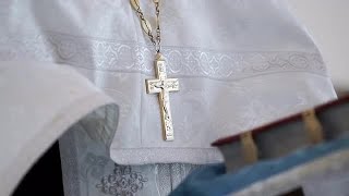 Priest Wearing A Crucifix Stock Video
