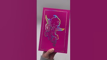 Special edition book with holographic cupid foil and black sprayed edges