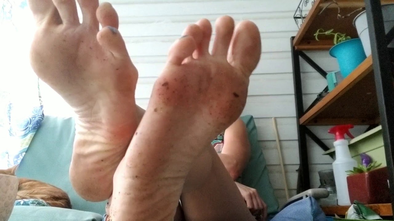 Dirty size 12 feet propped up by long legs, blue toenail polish YouTube