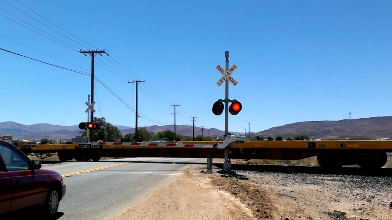 ***No Audio*** UP 4415 w/ a moving storage train over 10th St. E. - YouTube