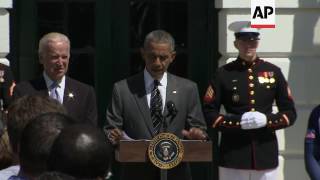 Obama Welcomes Wounded Vets to White House