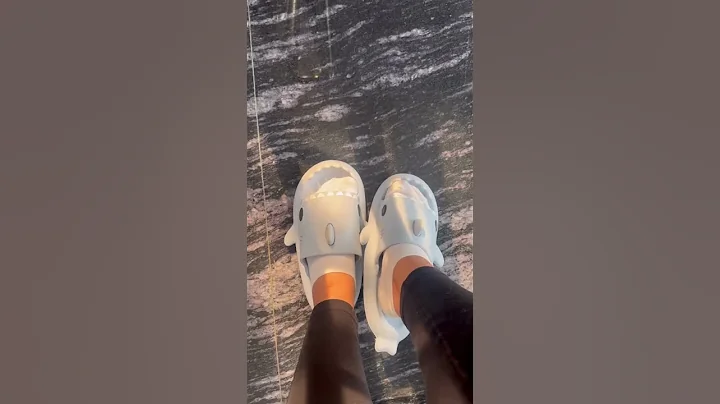 Dive into the trendiest footwear with our Shark Slippers! 🦈🩴