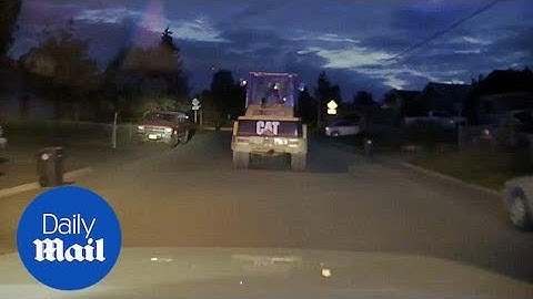 Alaskan cops in low-speed pursuit of stolen front loader - Daily Mail