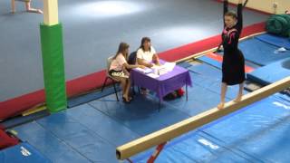 Apostolic Pentecostal Gymnast In A Skirt Doing Beam Routine.