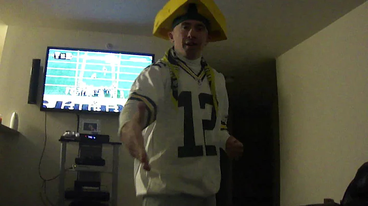 cheese head greenbay packers fan goes wild  for touchdown in superbowl