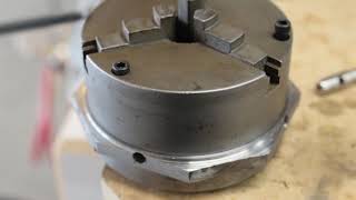 Truing your chuck.  Make your 3jaw chuck true by making it adjustable.