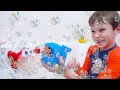 Katy and max playing with bath bubbles