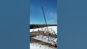reclaimed timber frame going up