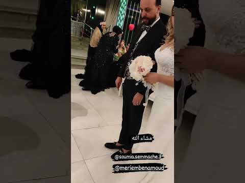 سمية السماش بالفستان الابيض مع زوجها عمار