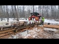 Timber King 2000 cutting frozen logs