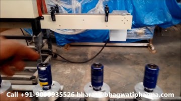 Empty Pet Bottle Automatic Shrink Sleeve Applicator with Heating Tunnel and Rotating Pucks