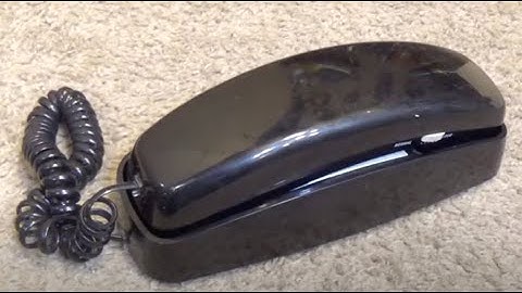 AT&T 210 Corded Trimline Telephone in Black | Initial Checkout