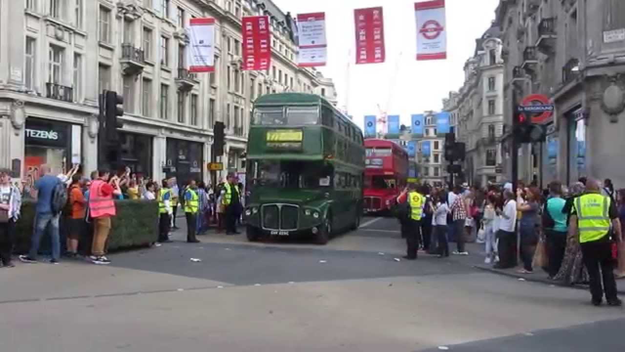 Classic 1960s buses leaving the London Bus Cavalcade in Regent Street