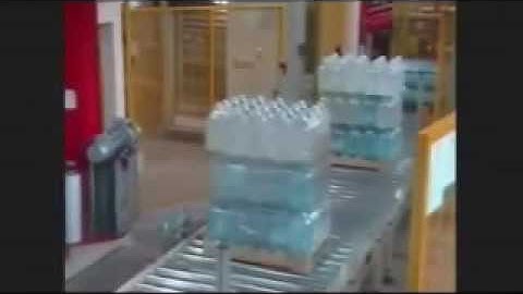 Rotary stretch wrapping machine and pallet wrapper