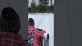 Дочка катает на снегоходе