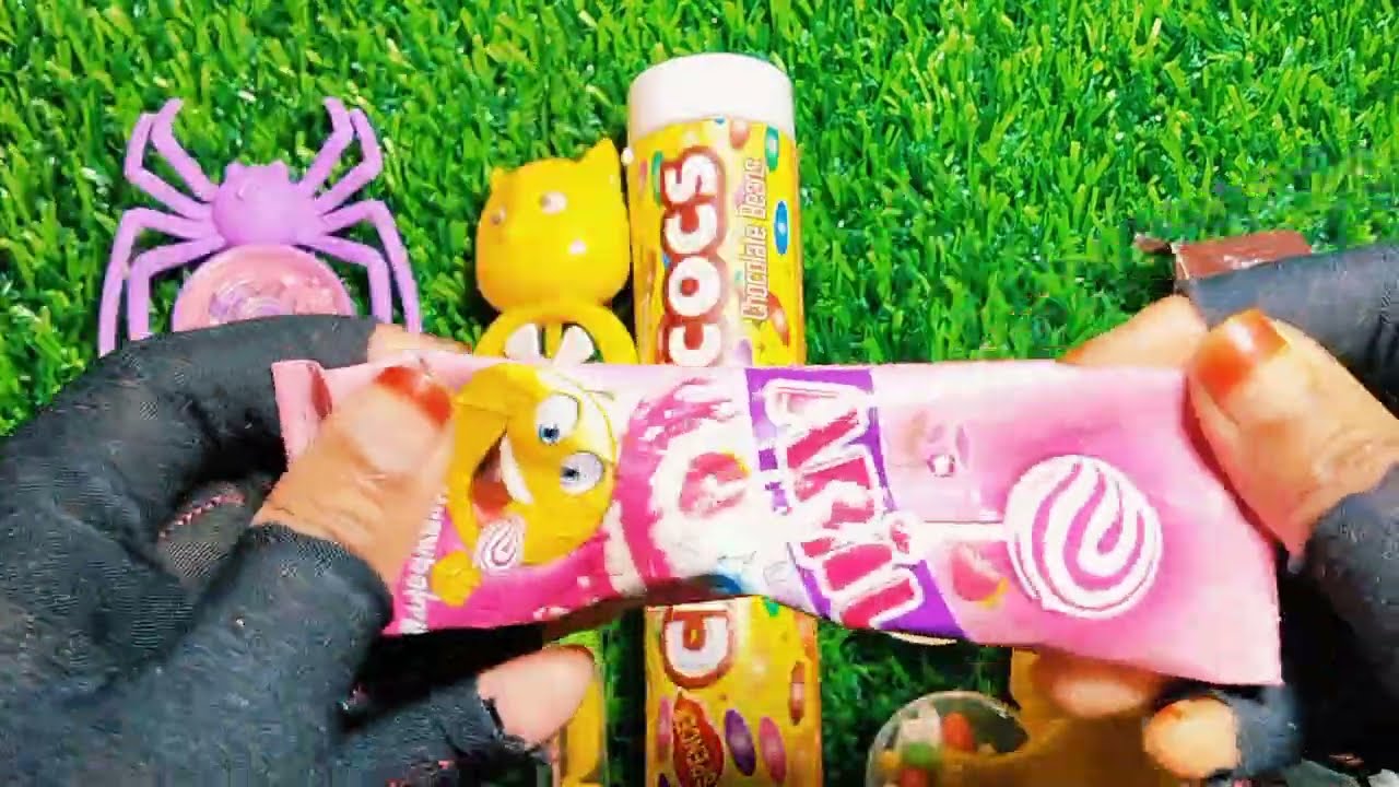 Asmr lollipops candy unboxing video Asmr opening video and chocolate gummy candy lollipop.