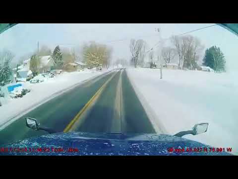 Semi truck loses control on icy road