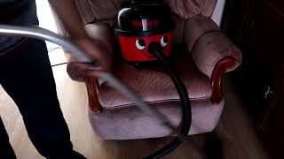 HENRY HOOVER HELPS TO CLEAN THE LOUNGE 