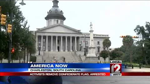 Woman removes Confederate flag in front of SC statehouse