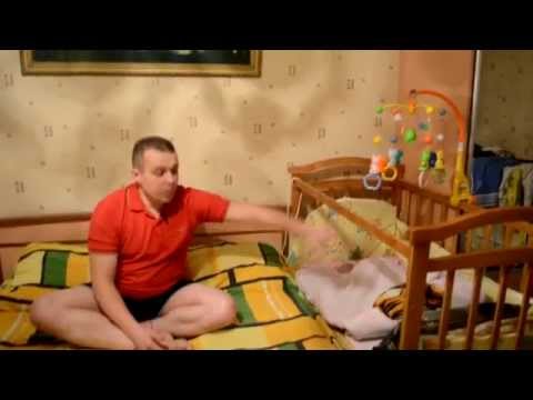 Видео: Как прикрепить детскую кроватку к кровати?