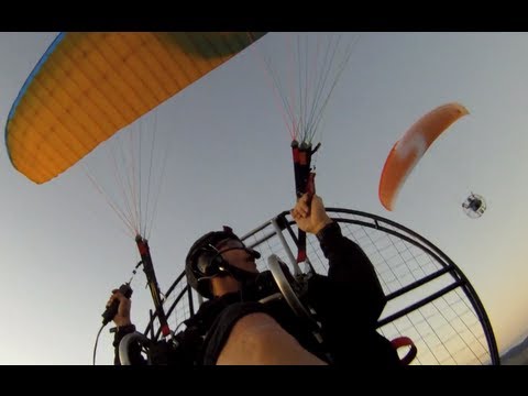 River running with Powered Paragliders
