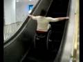 Man In Wheel Chair Falls Down Esculator ( escalator )