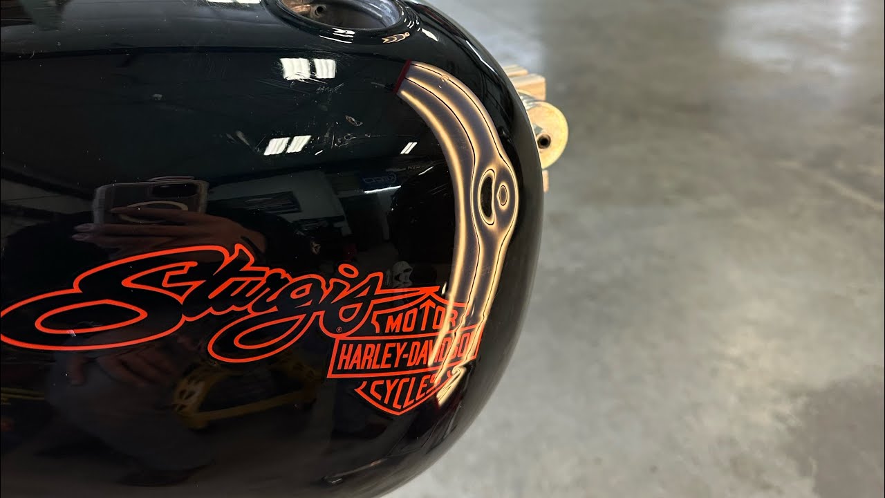 Motorcycle tank dent removed without painting using the paintless dent