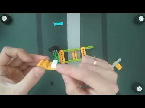 Видео: Программирование машинки с двумя моторами Lego Wedo 2 0