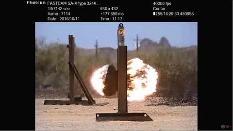 slow motion footage of a 120mm multi purpose Tank round in flight and detonation