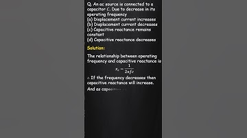 An AC source is connected to a capacitor .....